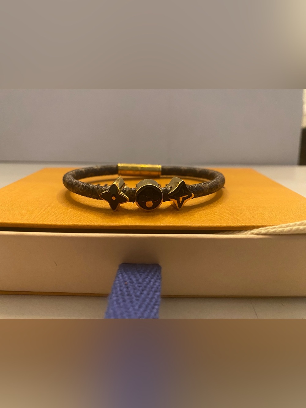 Louis Vuitton Brown Leather Bracelet with Gold Accents.  7.5 inches long.